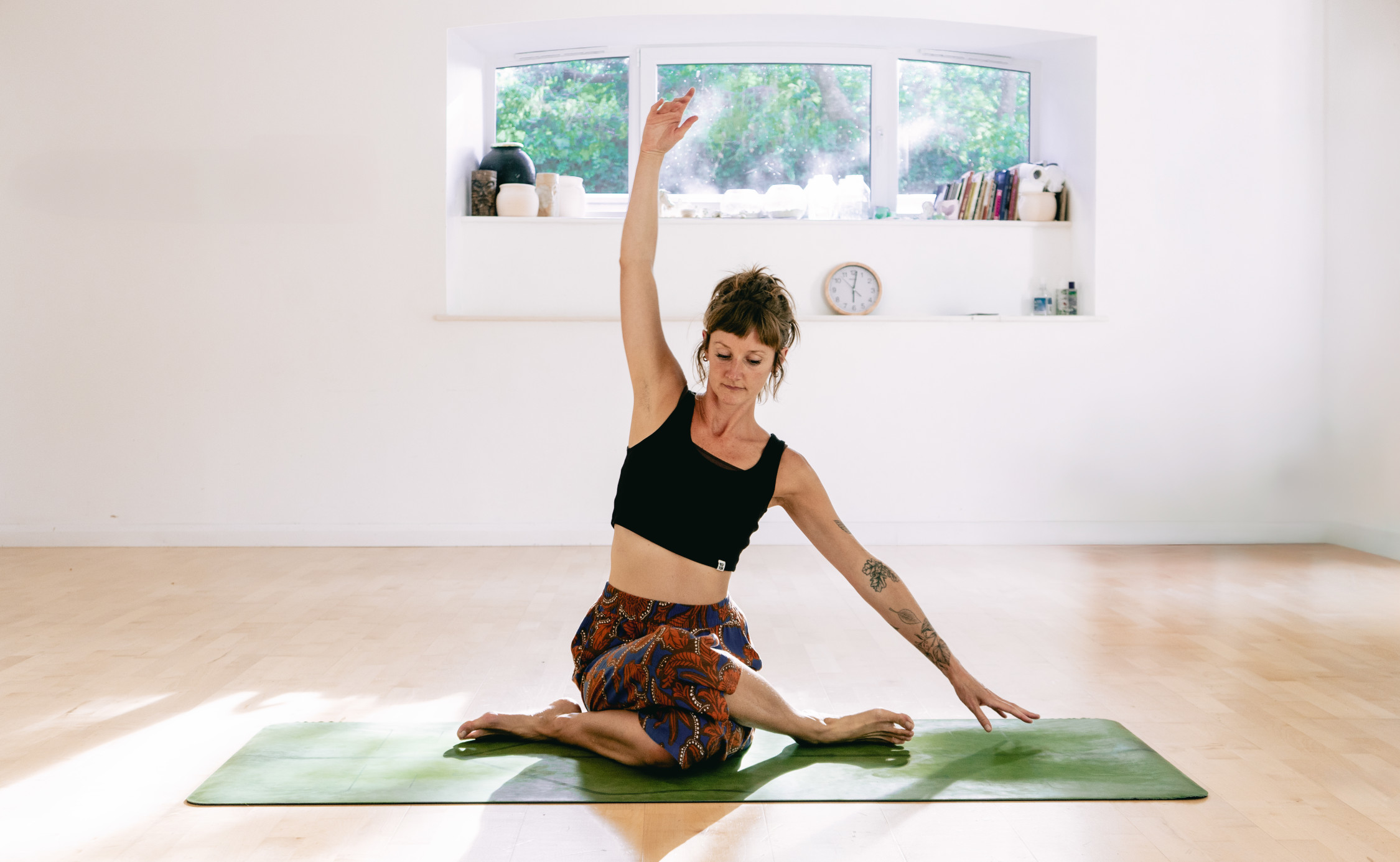 Coastal yoga setting at dawn
